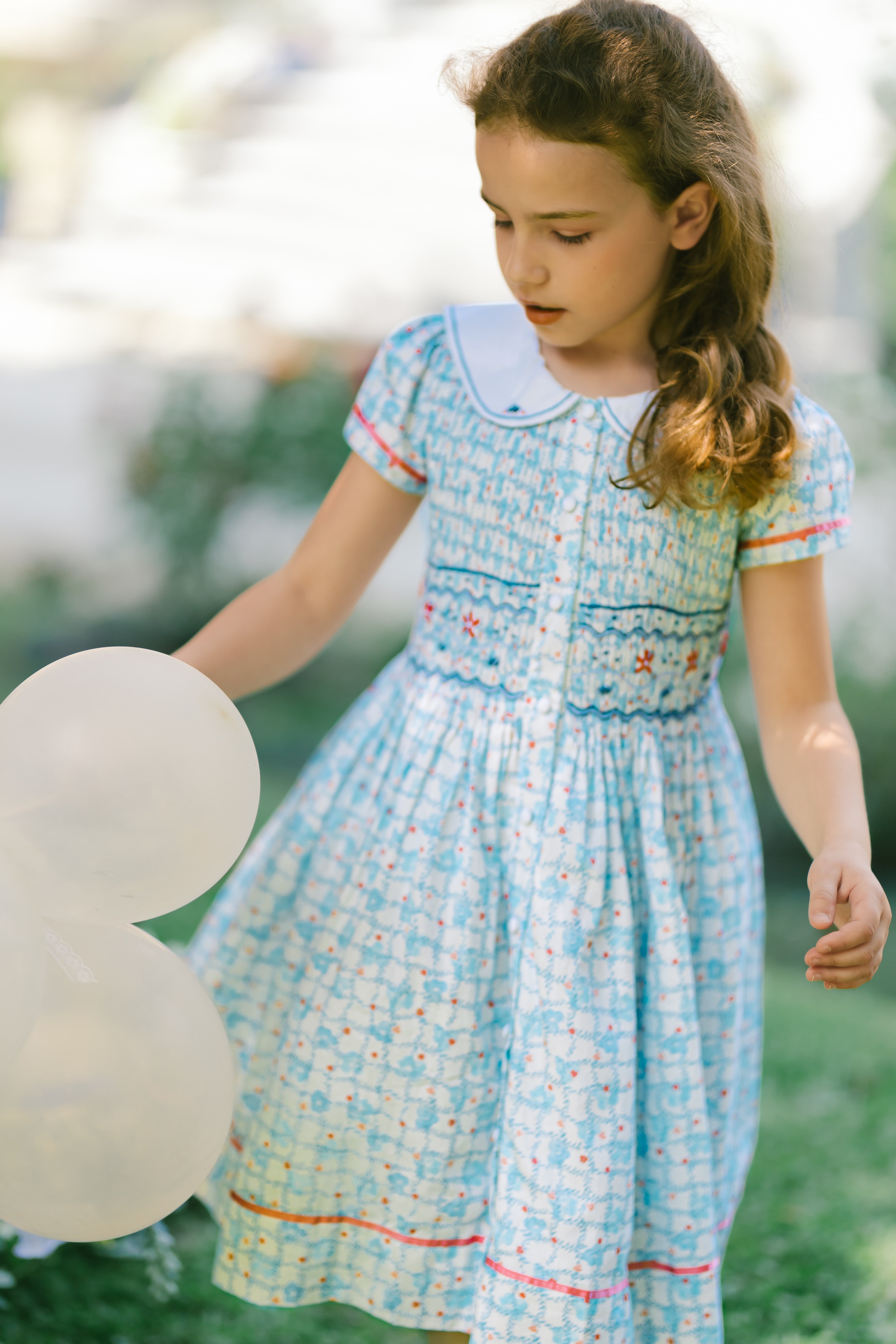 smocked floral dress Riviera Blue Short Sleeve Color:Navy / Black 100% Cotton Style Number sa_ER_AJEROW_AllPrice_BestSellers_Google We Wish We Owned