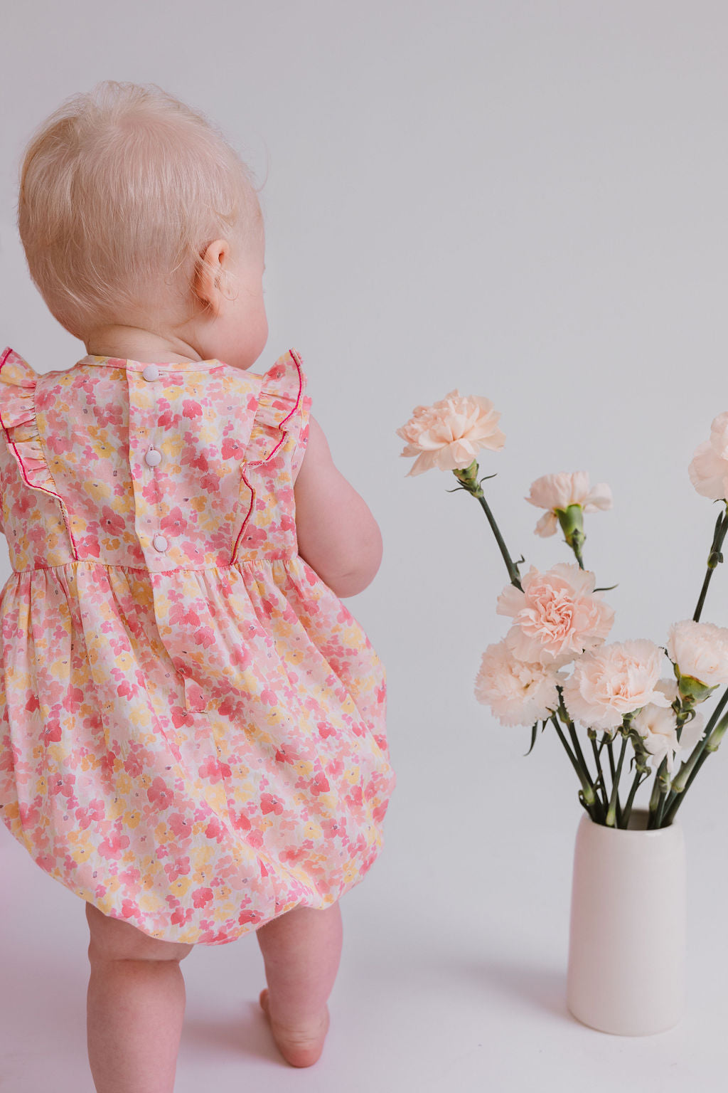 IRIS PINK BUBBLE FLORAL SMOCKED BUBBLE