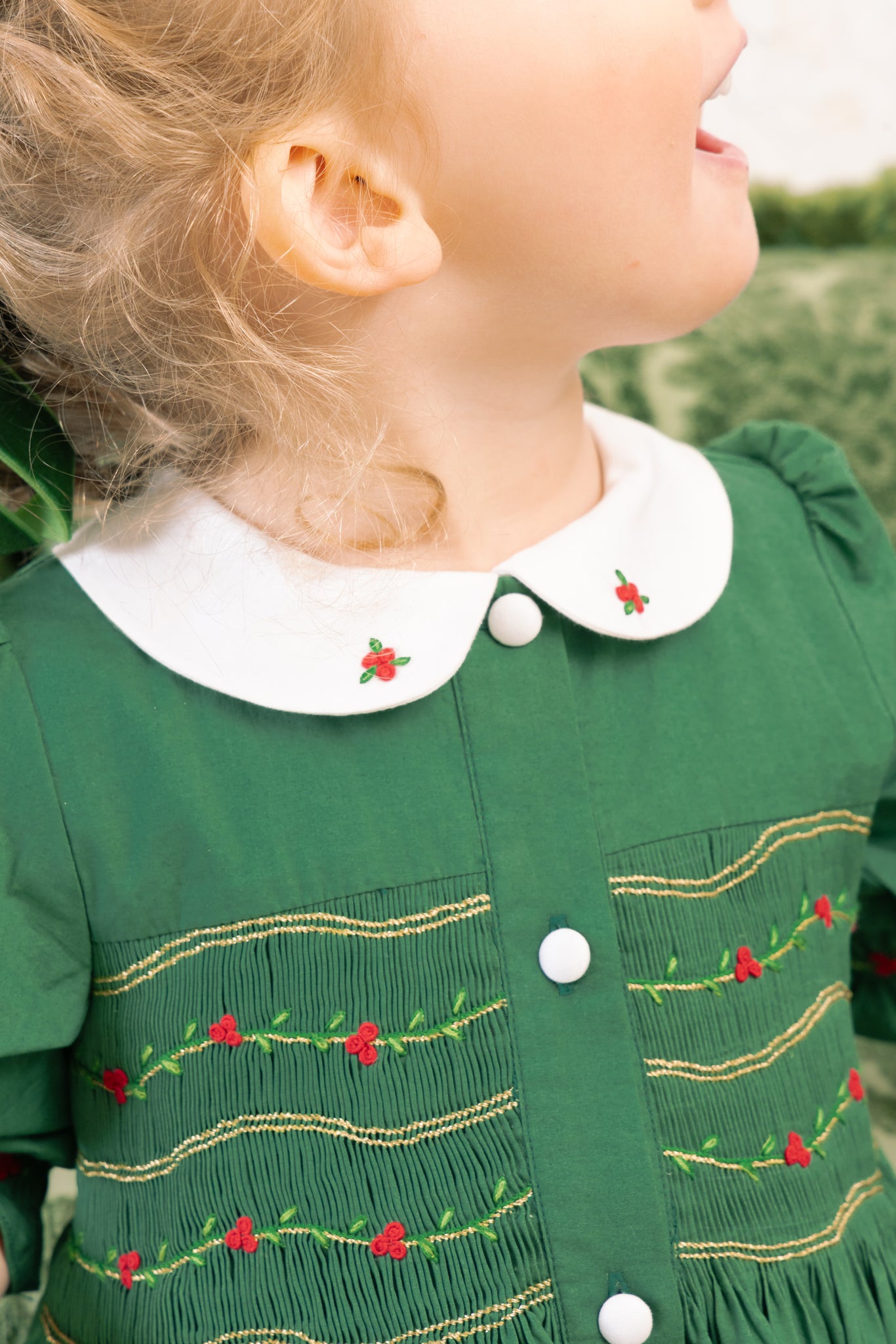 Close-up of details on Olympe Green Smocked Christmas Dress