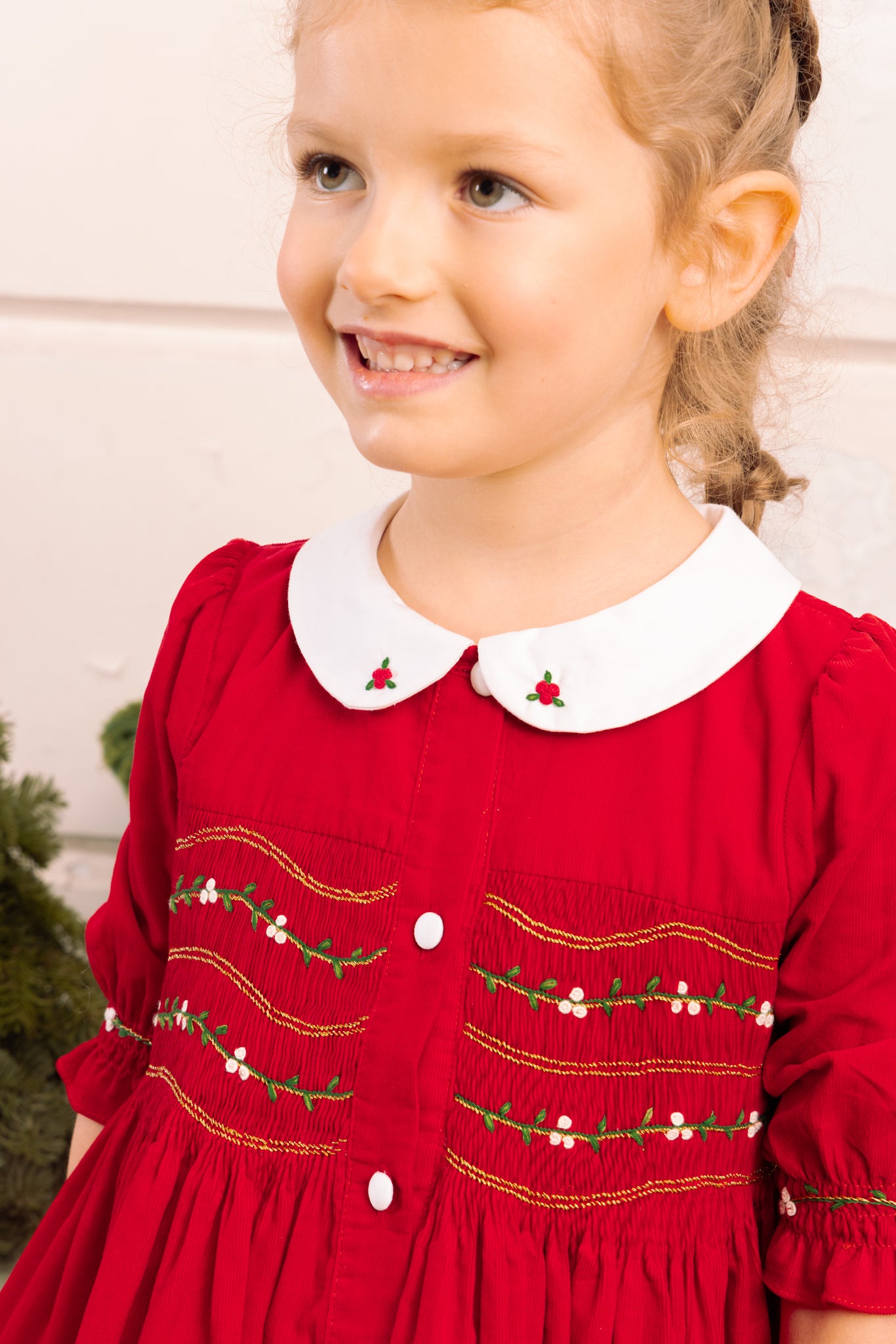 Close-up of Olympe Red Holiday Smocked Dress