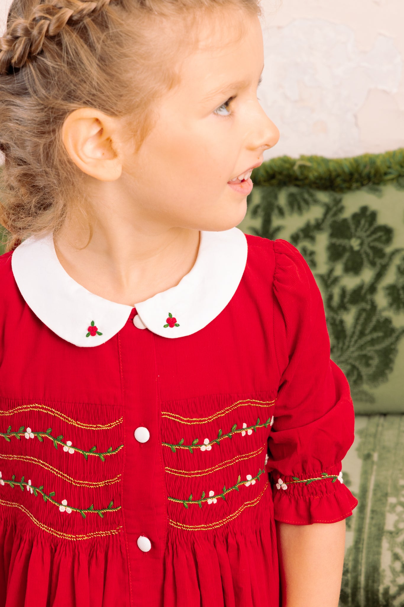 Close-up of details on Olympe Red Holiday Smocked Dress