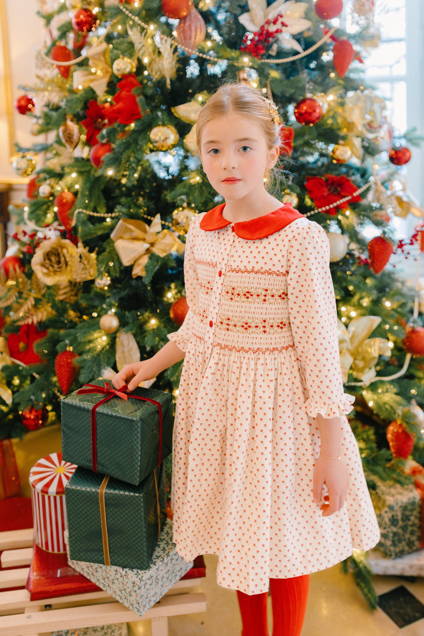 Close up to OLYMPE RED LONG SLEEVE SMOCKED DRESS